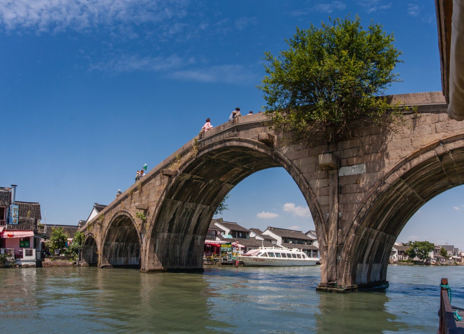 Tourists see the sights of ancient water town