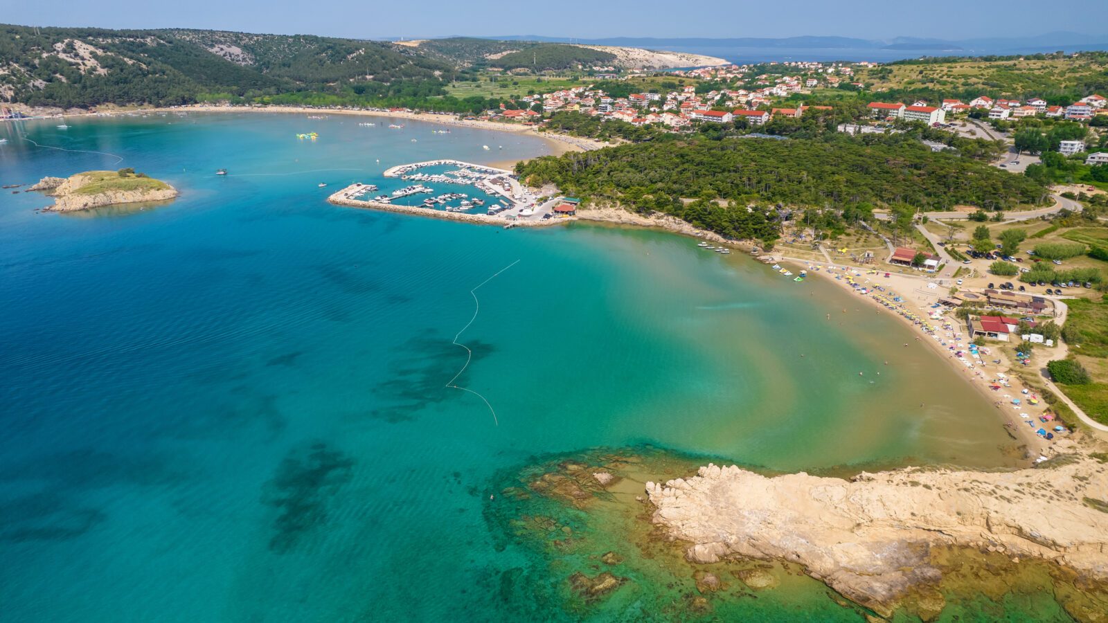 Aerial panorama of the stunning Rajska plaza beach on Rab Island, Croatia.